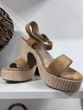 Beige suede platform espadrille sandals with adjustable ankle strap and woven jute heel.